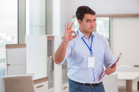 Sales assistant in furniture storeの写真素材