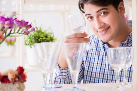 Young handsome man shopping in shopの写真素材