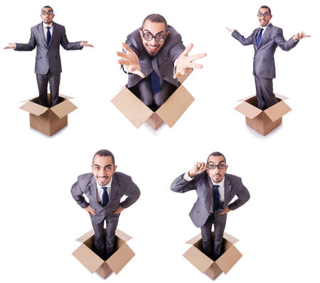 Man in thinking outside the box conceptの写真素材