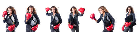 Young woman with boxing gloves isolated on whiteの写真素材