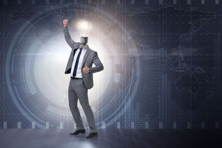 Businessman in new idea concept with light bulbの写真素材