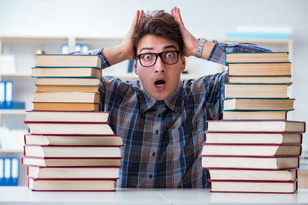 Nerd funny student preparing for university examsの写真素材