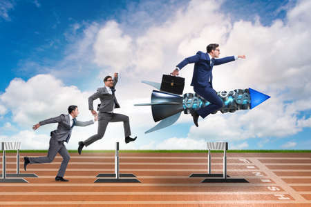 Competition concept with businessman and rocketの写真素材
