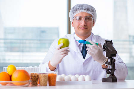 Nutrition expert testing food products in labの写真素材