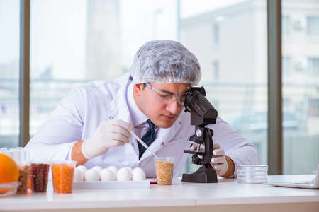 Nutrition expert testing food products in lab