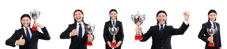 Businessman awarded with prize cup isolated on whiteの写真素材