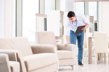 Sales assistant in furniture storeの写真素材