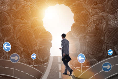 Businessman walking towards his ambition goal conceptの写真素材