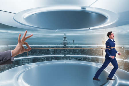 Staff retention concept with employee tied upの写真素材