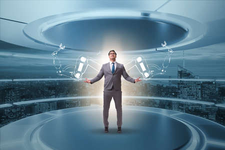 Businessman man with robotic arms