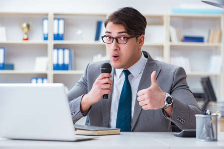 Businessman singing in the office