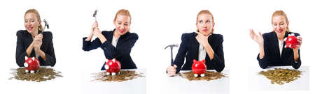Woman breaking piggy bank for savingsの写真素材