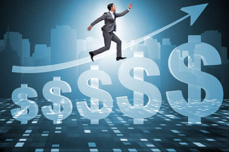 Businessman in american dollar conceptの写真素材