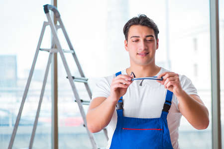 Young worker with safety gogglesの写真素材