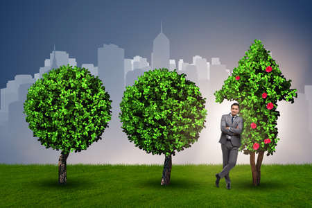 Businessman in sustainable green development conceptの写真素材