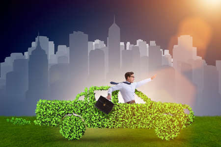 Electric car concept in green environment conceptの写真素材