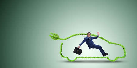 Electric car concept in green environment conceptの写真素材