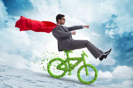 Green bycycle in environmentally friendly transportation conceptの写真素材