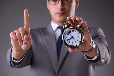 Businessman in time management concept