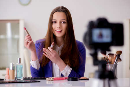 Beauty fashion blogger recording video for blogの写真素材