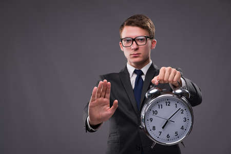 Businessman in time management conceptの写真素材