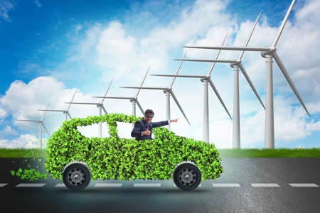 Electric car concept with windmillsの写真素材