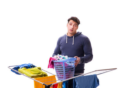 Husband man doing laundry isolated on whiteの写真素材