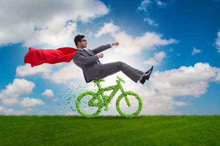 Green bycycle in environmentally friendly transportation conceptの写真素材