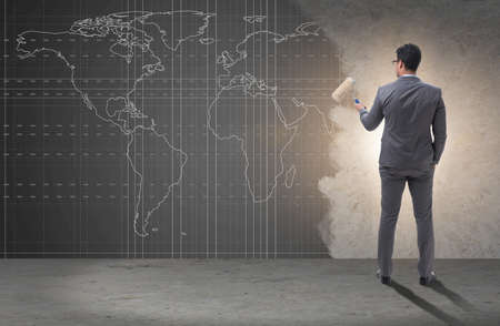 Businessman painting in business conceptの写真素材