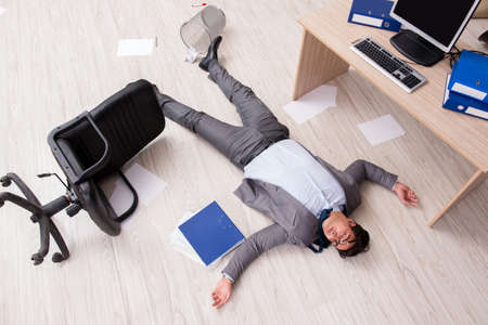 Businessman dead on the office floor