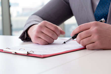 Businessman taking notes at the meetingの写真素材