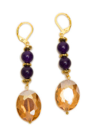 Nice earrings isolated on white backgroundの写真素材