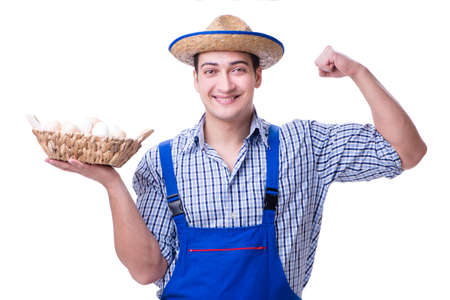 Man with a straw hat and eggsの写真素材