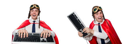 Funny hero with keyboard isolated on the whiteの写真素材