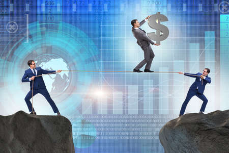 Businessman walking on tight ropeの写真素材