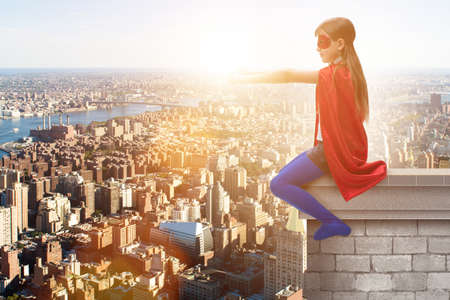 Little kid protecting the city from evilの写真素材