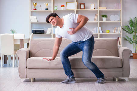 Man suffering from sick stomach and vomitingの写真素材