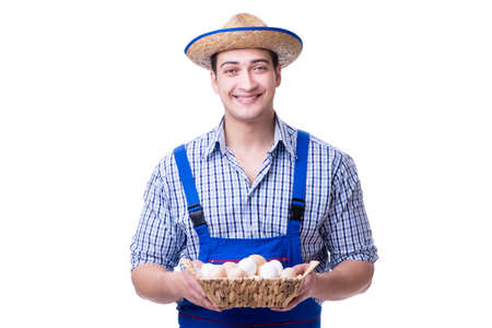 Man with a straw hat and eggsの写真素材