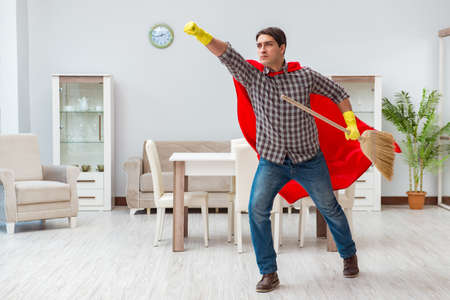 Super hero cleaner working at homeの写真素材