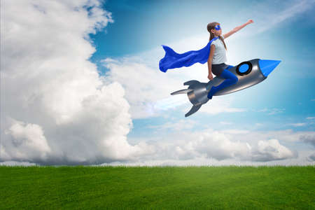 Little girl flying rocket in superhero concept