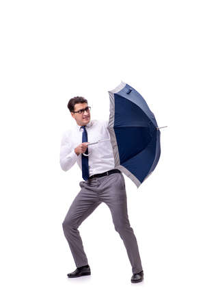 Young businessman with umbrella isolated on whiteの写真素材