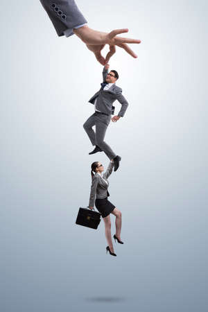 Recruitment concept with hand picking employeeの写真素材