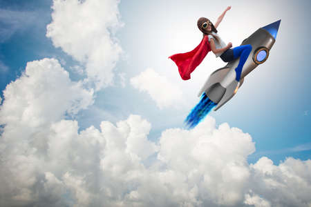 Little girl flying rocket in superhero conceptの写真素材