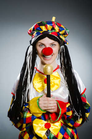 Funny clown in comical conceptの写真素材
