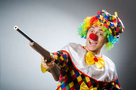 Funny clown in comical conceptの写真素材