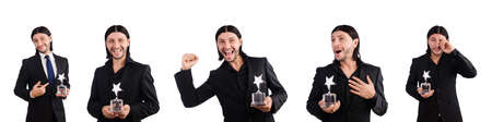 Businessman with star award isolated on white