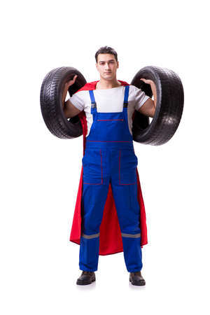 Superhero man with tyre isolated white backgroundの写真素材