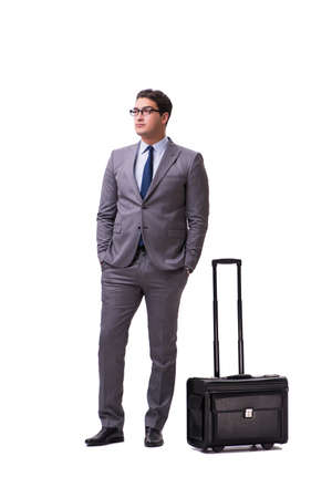 Young man during business travel isolated on whiteの写真素材