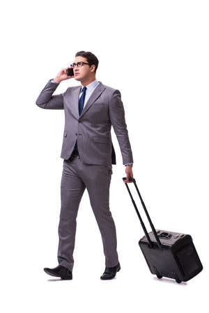 Young man during business travel isolated on whiteの写真素材