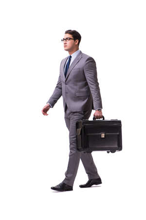 Young man during business travel isolated on whiteの写真素材